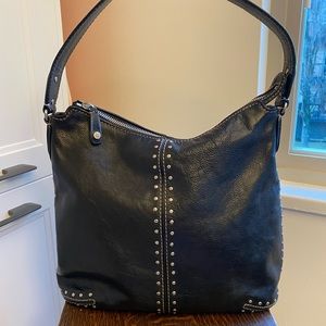 Michael Kors “Astor” Studded black leather hobo bag with zippered closure